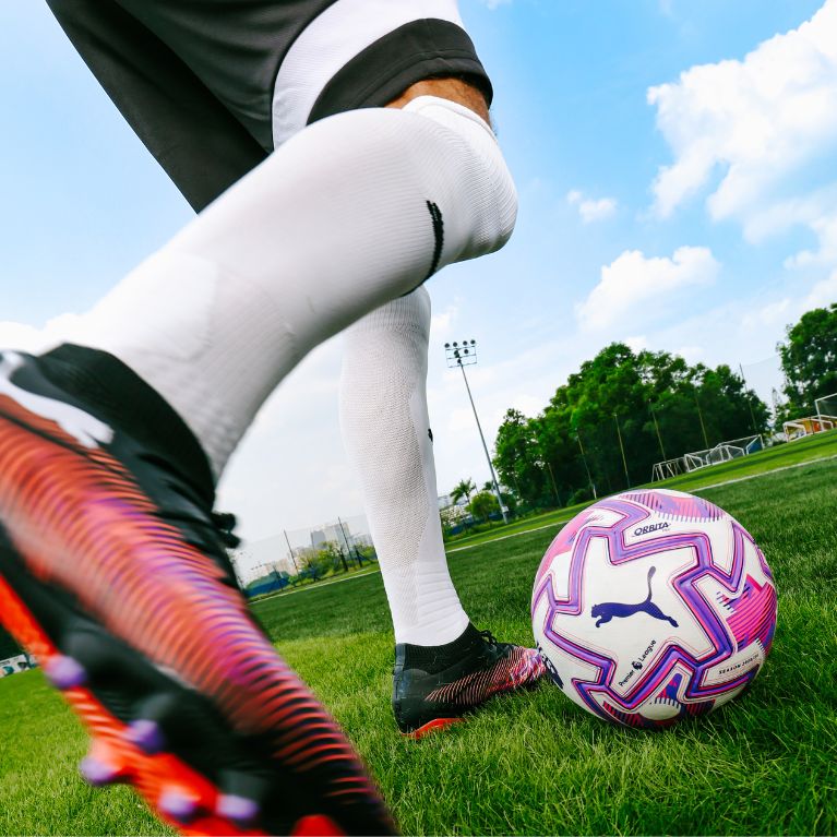 A man with football boots